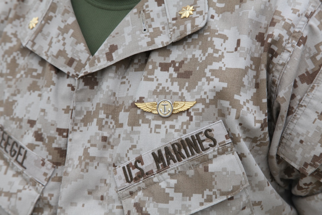 Marine Air Support Squadron 1 Marines now wear the Naval Aviation Observer Wings they were awarded March 25. The wings were typically awarded to operators of the OV-10 Bronco surveillance aircraft only, which were phased out of service in 1995. According to Marine Administrative Message 091/11, released Feb. 11, Marines involved with air support control operations may now wear the wings as well.