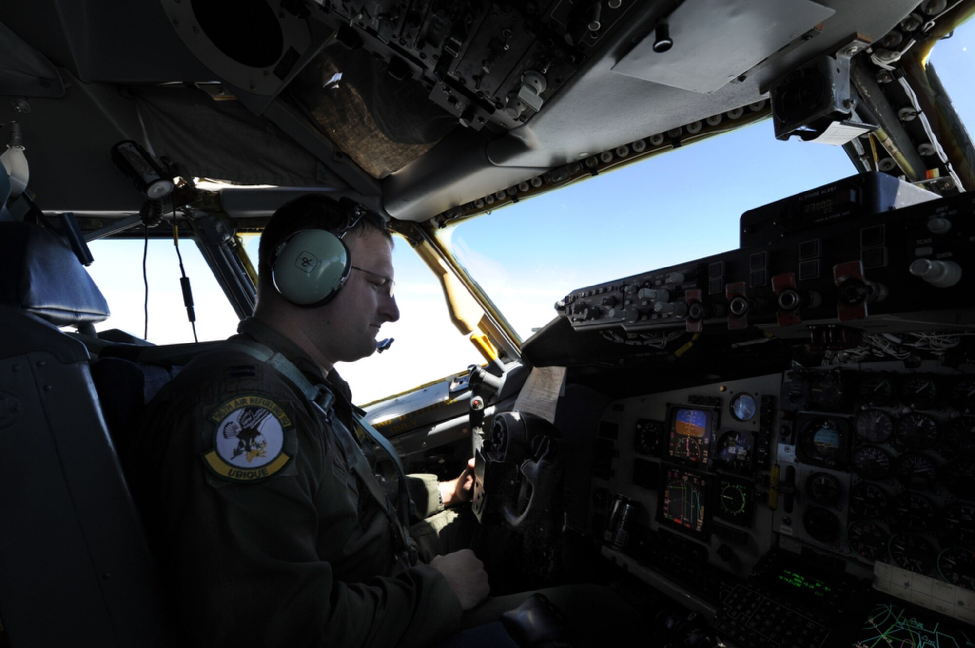 Captain Jeremy Buxton, a KC-135 pilot assigned to the 96th Air Refueling Squadron, Joint Base Pearl Harbor-Hickam, Hawaii verifies his heading prior to meeting with jets from the 44th Expeditionary Figher Squadron for refueling on March 23 over Thailand air space during Cope Tiger 2011,  an annual, multilateral, joint field training exercise currently being conducted at Korat and Udon Thani Royal Thai Air Bases March 14 through 25. Participants of Cope Tiger include the U.S. Air Force, the U.S. Marine Corps, the Royal Thai Air Force, Royal Thai Army, and the Republic of Singapore Air Force. (U.S.  Air Force photo/Master Sgt. Cohen A. Young)