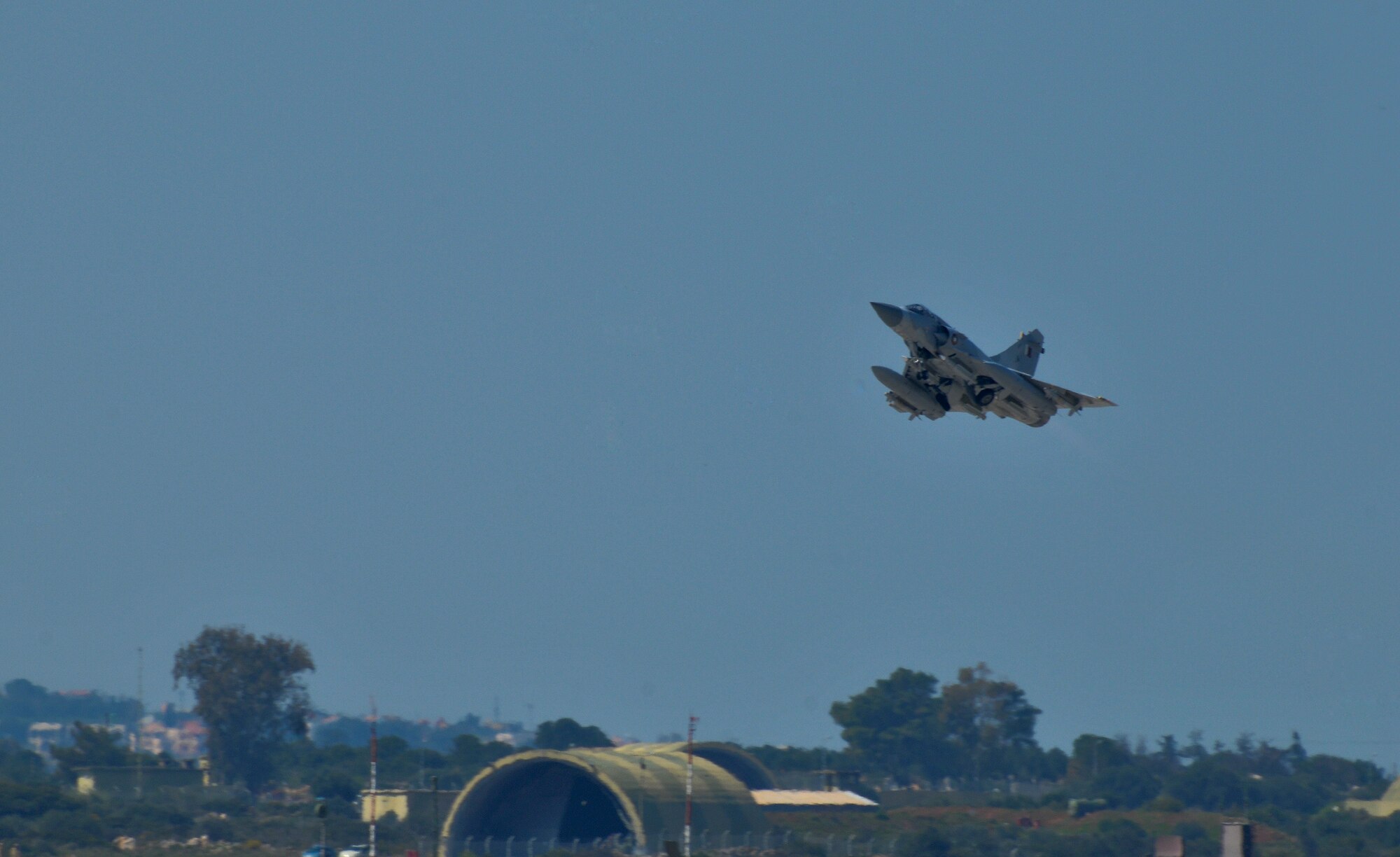 A Qatar Emiri Air Force Mirage 2000-5 takes off March 25, 2011, in support of a Joint Task Force Odyssey Dawn mission. Qatar is the newest member of the coalition supporting the no-fly zone over Libya.  (U.S. Navy photo/Paul Farley)