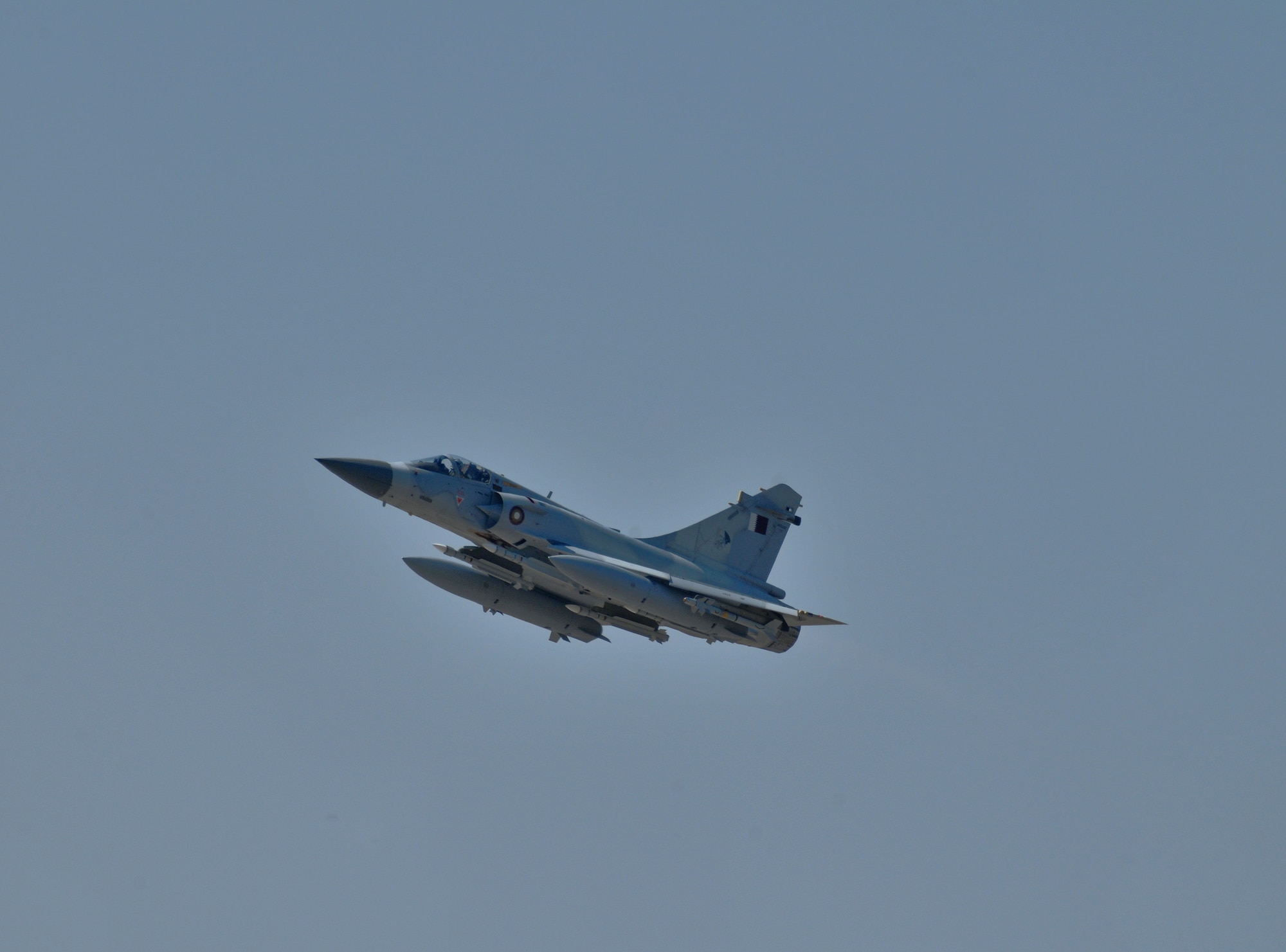 A Qatar Emiri Air Force Mirage 2000-5 flies its first mission March 25, 2011, in support of Operation Odyssey Dawn. Qatar is the newest member of the coalition supporting the no-fly zone over Libya.  (U.S. Navy photo/Paul Farley)