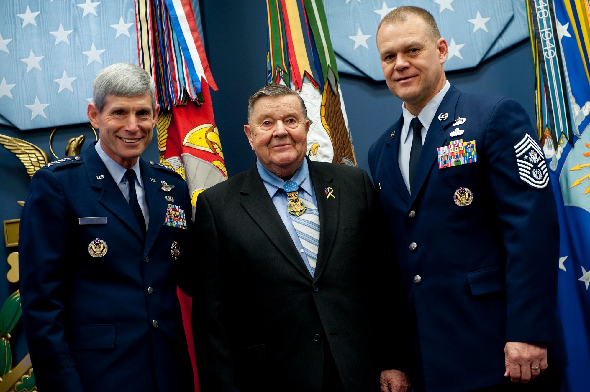 Air Force Chief of Staff Gen. Norton Schwartz, Medal of Honor recipient retired Col. Joe Jackson and Chief Master Sgt. of the Air Force James A. Roy visit March 25, 2011, prior to a ceremony honoring the 150th anniversary of the Medal of Honor in the Hall of Heroes at the Pentagon in Washington, D.C. (Department of Defense photo/Petty Officer 1st Class Chad J. McNeeley)