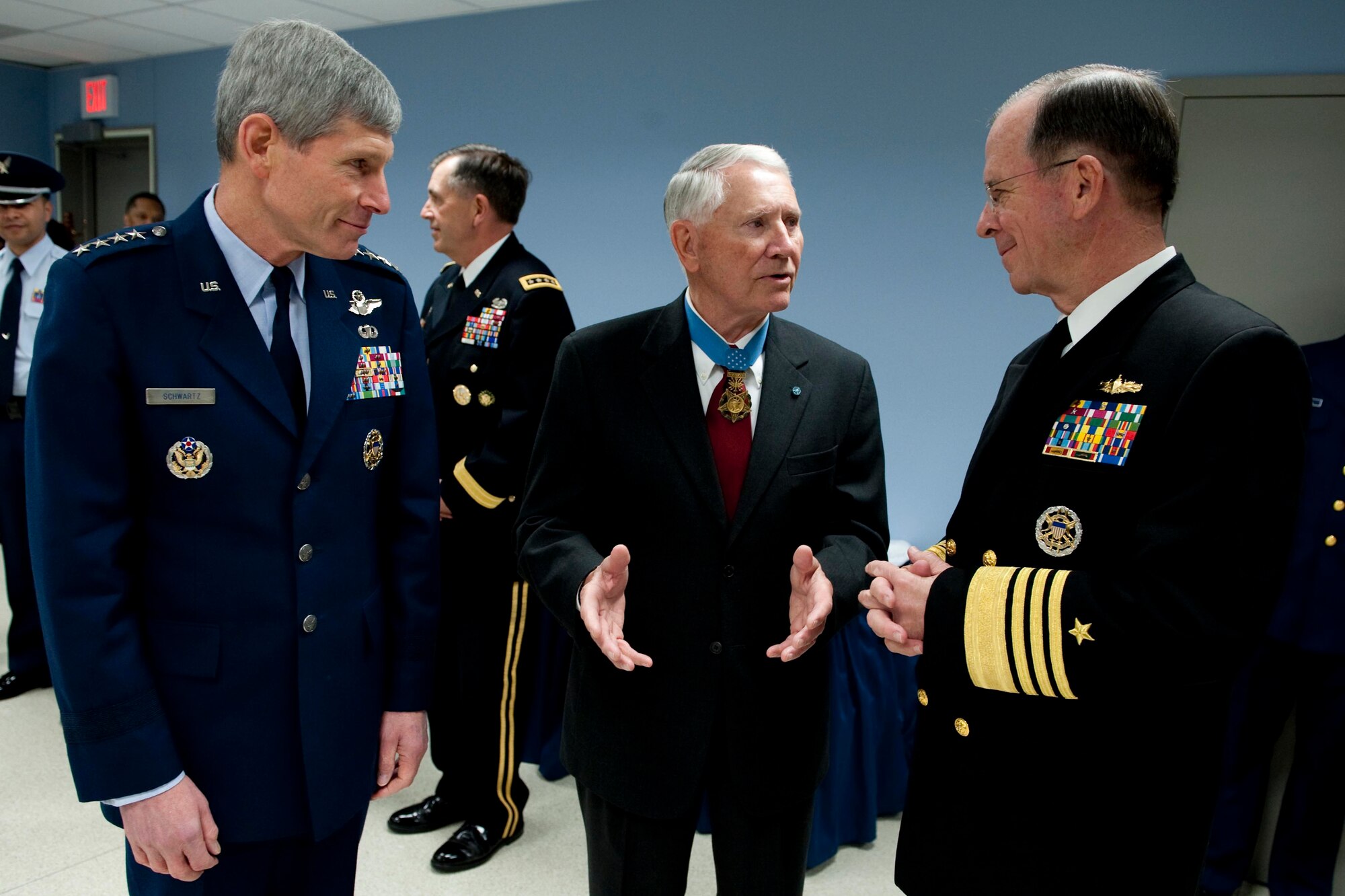 Retired Col. Leo K. Thorsness, president of the Congressional Medal of Honor Society, speaks with Air Force Chief of Staff Gen. Norton Schwartz and U.S. Navy Adm. Mike Mullen, chairman of the Joint Chiefs of Staff, March 25, 2011, prior to a ceremony honoring the 150th anniversary of the Medal of Honor in the Hall of Heroes at the Pentagon in Washington, D.C. (Department of Defense photo/Petty Officer 1st Class Chad J. McNeeley)