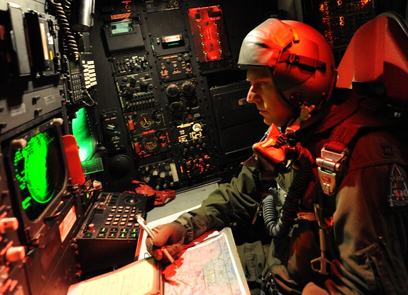 Capt. Robert Campbell, 11th Bomb Squadron navigator, reviews maps during a sortie from Barksdale Air Force Base, La., March 25. The navigator's main priority is to keep the aircrew on schedule. (U.S. Air Force photo/Senior Airman Alexandra M. Boutte) (RELEASED)