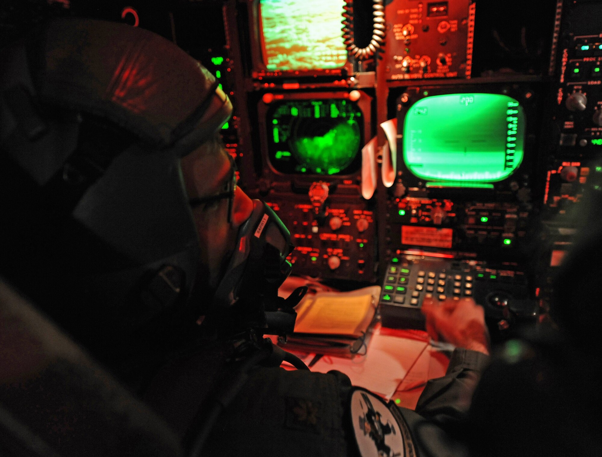 Maj. Jonathon Beavers, 11th Bomb Squadron radar navigator, prepares for a sortie in a B-52H Stratofortress on Barksdale Air Force Base, La., March 25. The radar navigator sits with the navigator on the second floor of the B-52H and keeps in contact with the pilot throughout the flight. (U.S. Air Force photo/Senior Airman Alexandra M. Boutte) (RELEASED)