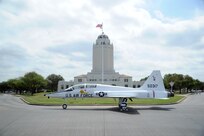 The T-38 anniversary plane parked in front of the Taj, located at Randolph Air Force Base, Texas.  The T-38 has been instrumental in the foundation for United States fighter pilot training.  On March 17, 1961, the T-38 in its original white gloss finish arrived at Randolph Air Force Base and was assigned to what was then, the 3510th Flying Training Wing. Initially used for supersonic jet training, the T-38 began its history training pilots in initial qualification and upgrade training capabilities, teaching more than 70,000 American and international fighter pilots ever since. (U.S. Air Force photo/Rich McFadden)