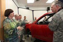 Dr. Rebecca Hooper tells monthly leadership forum attendees about programs for wounded, ill and injured service members at the Center for the Intrepid March 16. Dr. Hooper is a program manager at the center. (U.S. Air Force photo/Robbin Cresswell)