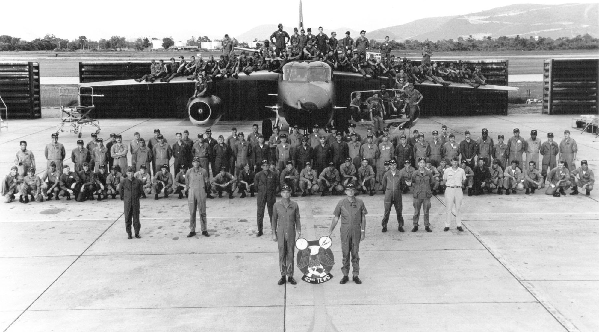 Personnel of the 42nd Tactical Electronic Warfare Squadron at Takhli in 1970. Aircrew are on the ground and maintenance personnel are on the aircraft. (U.S. Air Force photo)