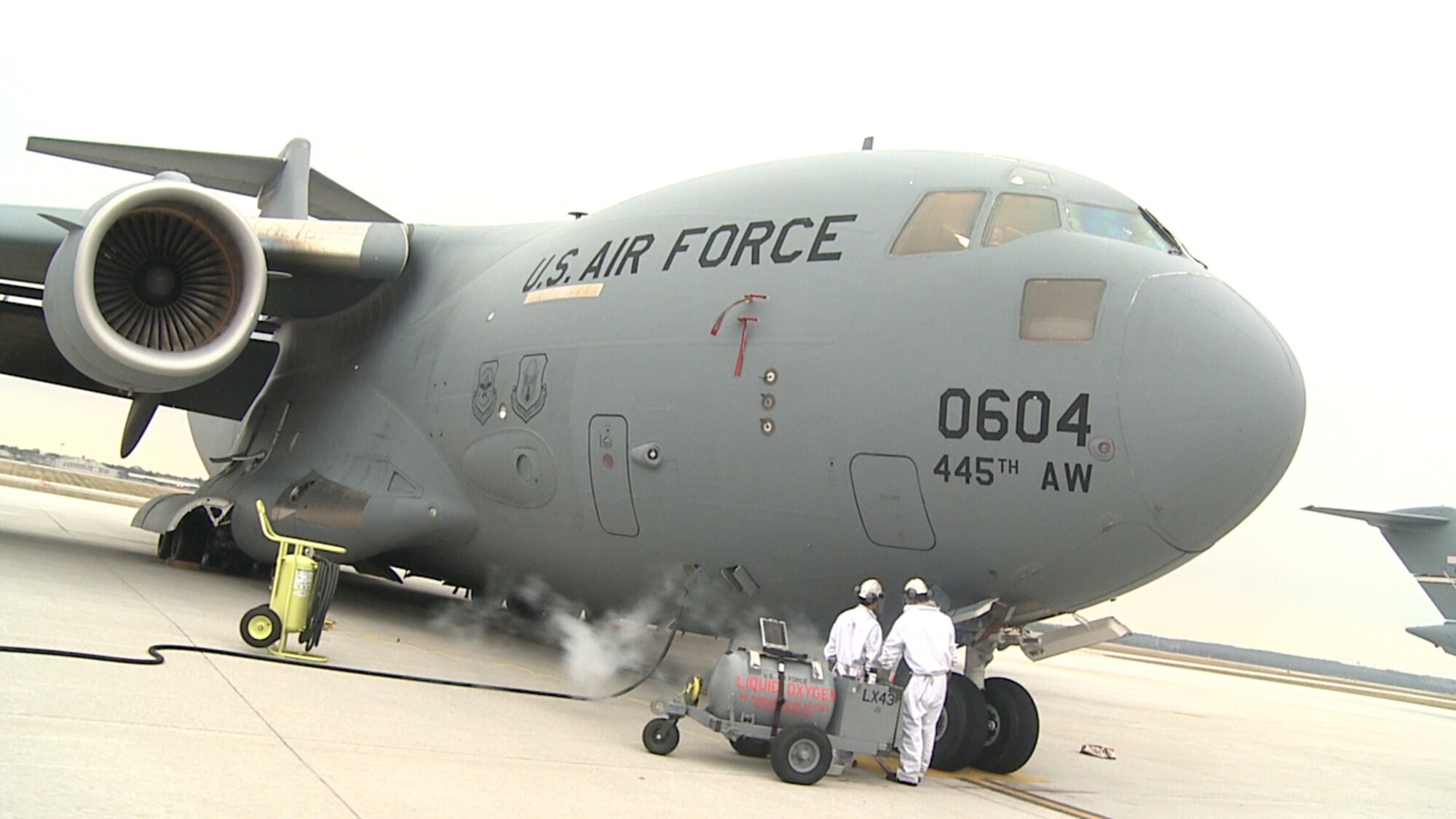 WRIGHT-PATTERSON AIR FORCE BASE, Ohio - Members of the 445th Maintenance Squadron use liquid oxygen as they perform pre-flight duties on the C-17 Globemaster III March 18. (U.S. Air Force photo/Ken LaRock)