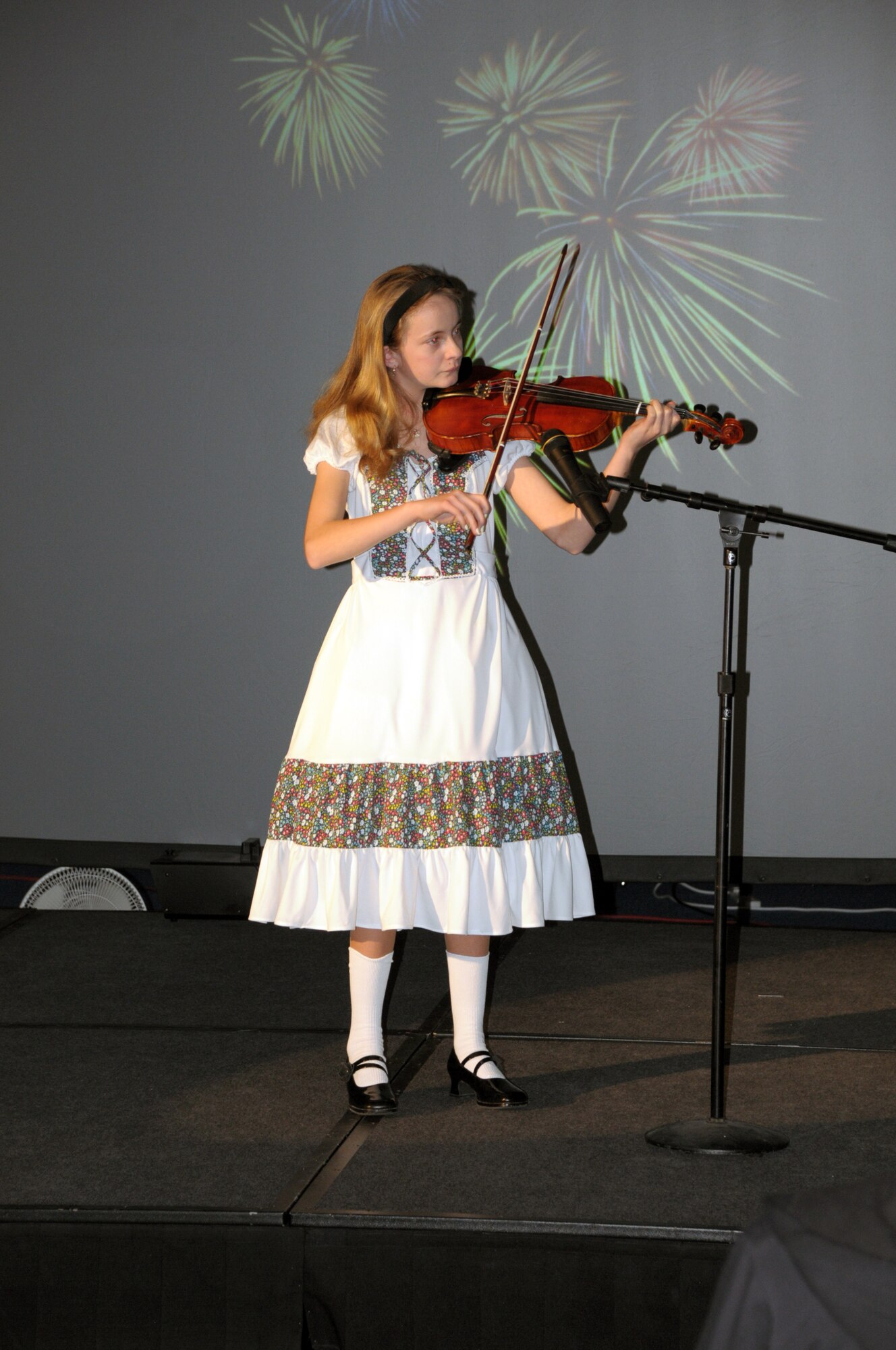 Jessie Walker performs “Stars of the County Down” on violin during Warren’s “You Got Talent” competition in the Fall Hall Community Center March 18. (U.S. Air Force photo by Blaze Lipowski)