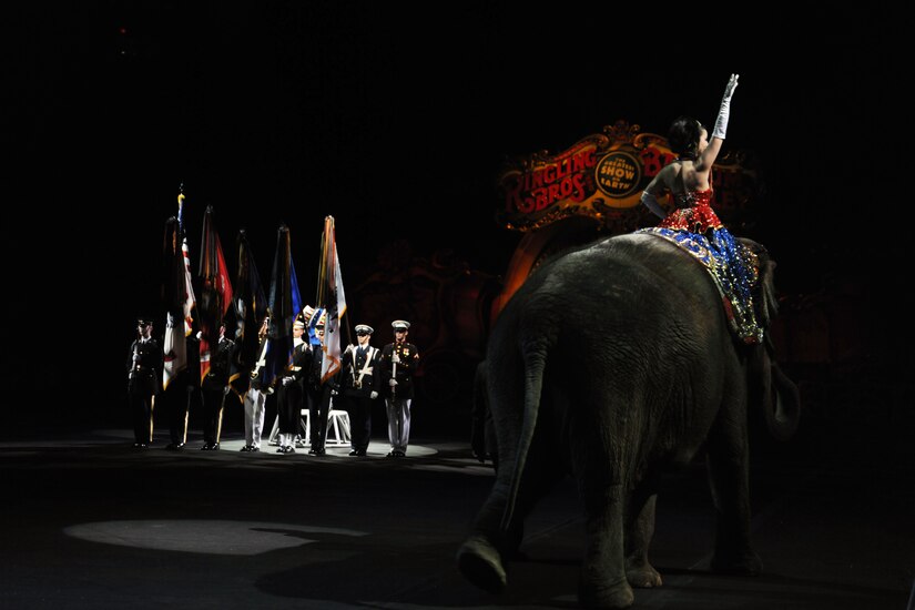 Members of the Military District of Washington Joint Service Honor Guard present the colors before the beginning of the Ringling Brothers and Barnum & Bailey Circus March 24 at the Verizon Center, Washington, D.C.  The March 24 show was a salute to military heroes, with many wounded warriors from Walter Reed Army Medical Center and their families in attendance. (U.S. Air Force photos by Senior Airman Torey Griffith)