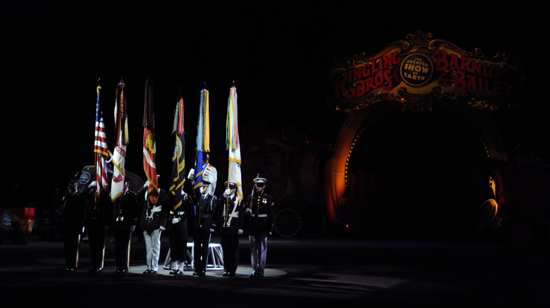 Members of the Military District of Washington Joint Service Honor Guard present the colors before the beginning of the Ringling Brothers and Barnum & Bailey Circus  March 24 at the Verizon Center, Washington, D.C.  The March 24 show was a salute to military heroes, with many wounded warriors from Walter Reed Army Medical Center and their families in attendance. (U.S. Air Force photos by Senior Airman Torey Griffith)