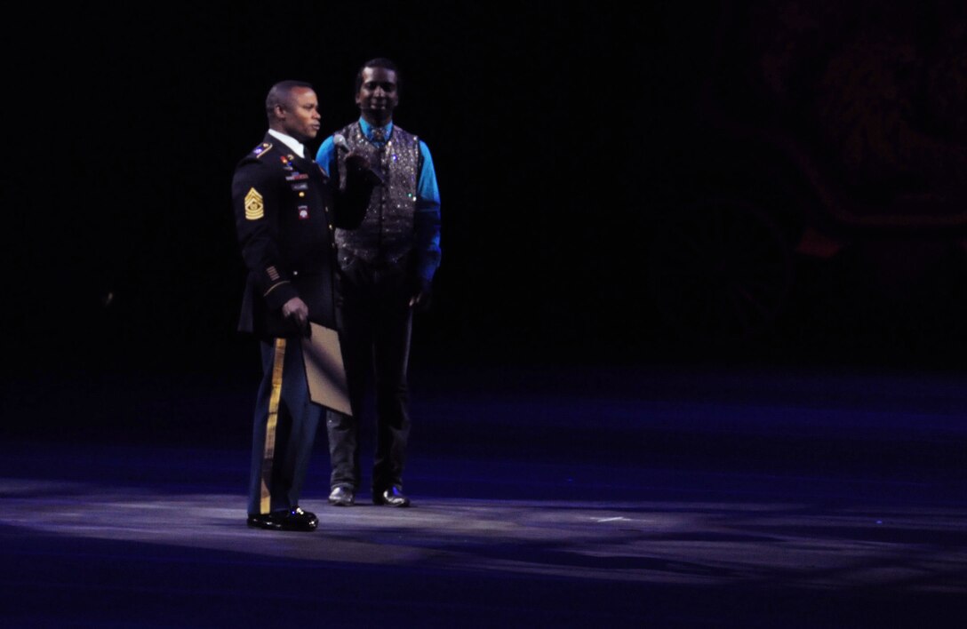 Army Command Sgt. Maj. Mike Williams, U.S. Army District of Washington, on behalf of the Sergeant Major of the Army, Raymond F. Chandler III,  opens the show as honorary ringmaster March 24 at the Verizon Center in Washington, D.C. The show was a salute to military heroes, with many wounded warriors from Walter Reed Army Medical Center and their families in attendance.