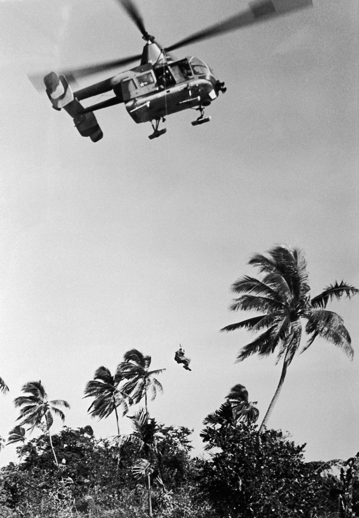 HH-43 Pedro hoisting a pilot in Southeast Asia. (U.S. Air Force photo)