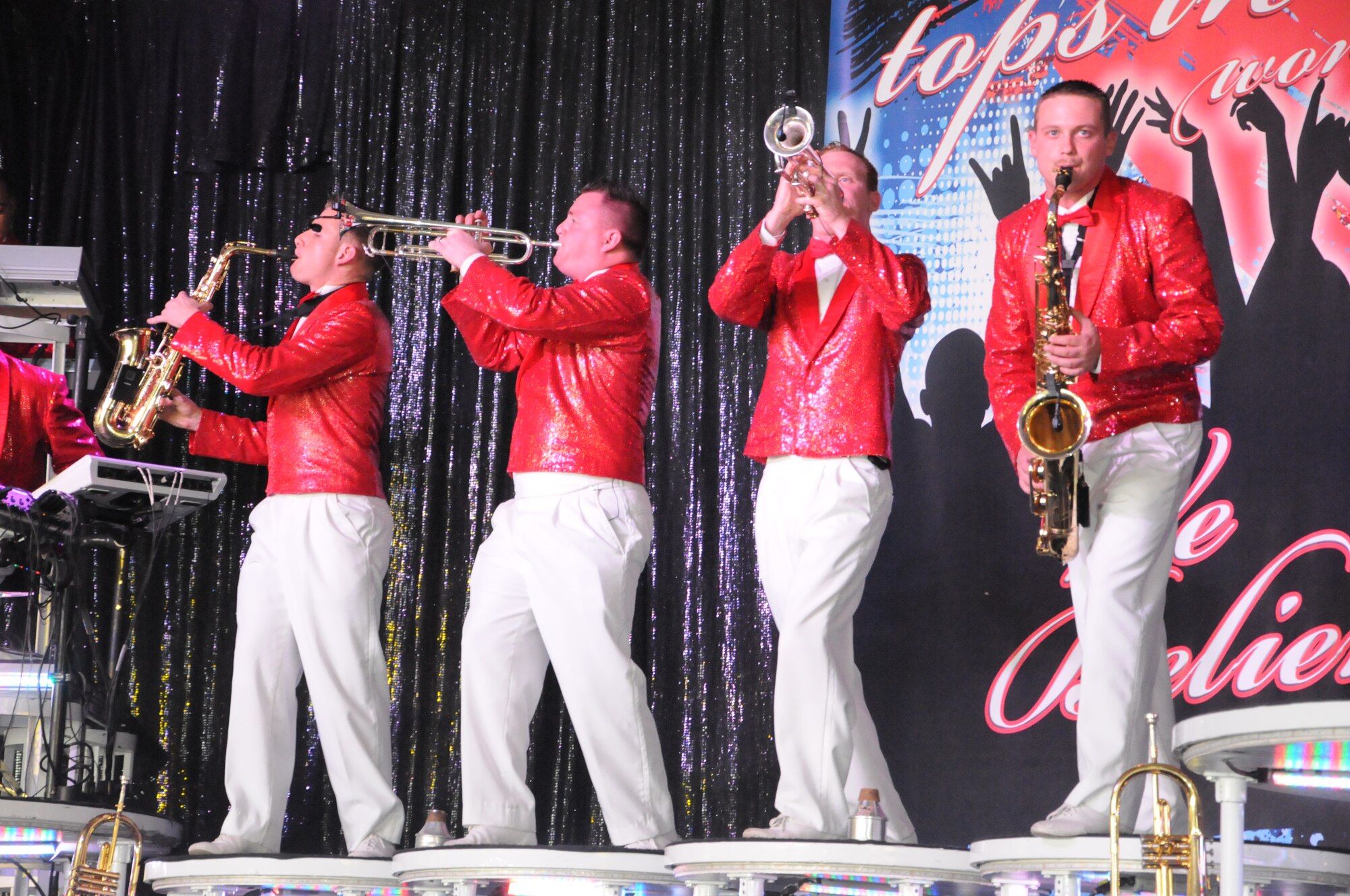 LAUGHLIN AIR FORCE BASE, Texas - - Tops in Blue performed for hundreds of service members, spouses and children in the weather hangar here for the Thursday night performance by Tops in Blue. (U.S. Air Force photo by Airman 1st Class Blake Mize)