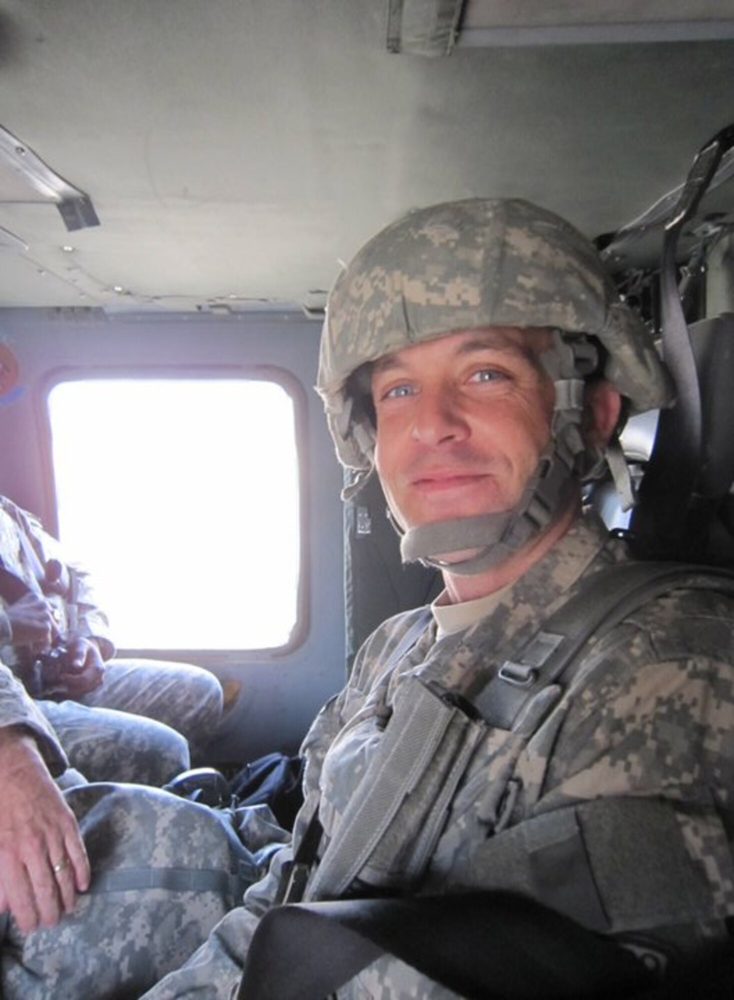 Tech. Sgt. Dwayne Bell, 43rd Airlift Group Judge Advocate Paralegal, prepares for a mission while stationed at Kabul Compound, Afghanistan. During his deployment, Sergeant Bell would visit nearby villages to discuss pending humanitarian projects. (Courtesy Photo)
