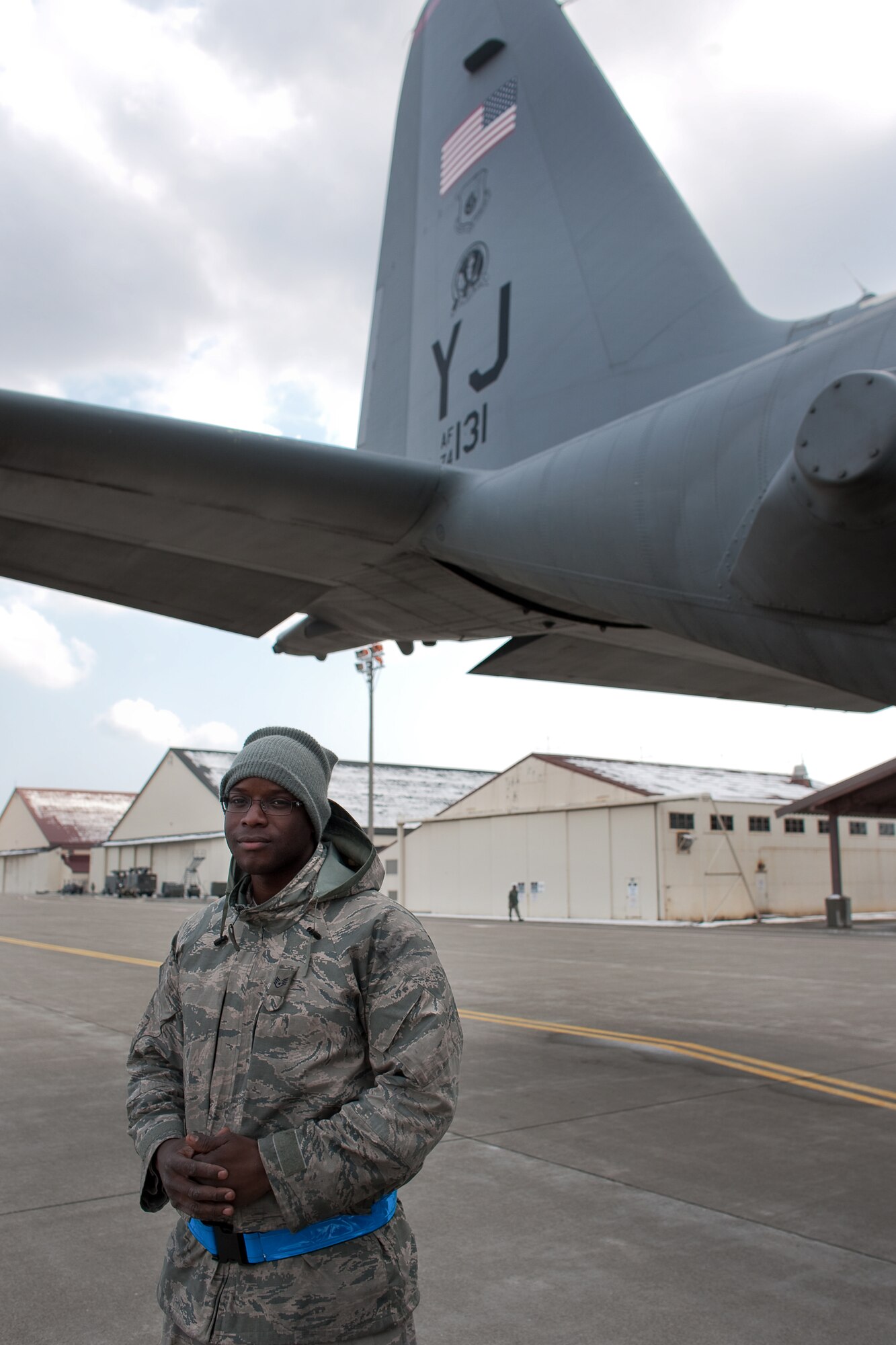 MISAWA AIR BASE, Japan -- Staff Sgt. Brandon Benson, 374th Aircraft Maintenance Squadron, is a C-130 aircraft engine mechanic at Yokota Air Base, Japan. A native of Charlotte, North Carolina, Sergeant Benson inspects jet engine turbine blades to detect cracks, distortions, corrosion, security, or other types of damage. He also performs regular comprehensive engine checks to ensure safe and efficient flight operations. (U.S. Air Force photo/Osakabe Yasuo)