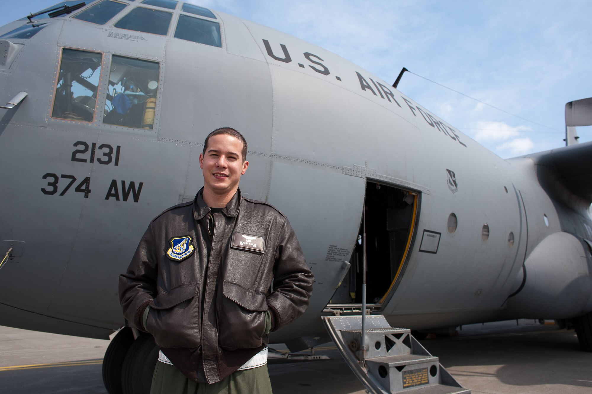 MISAWA AIR BASE, Japan -- Staff Sgt. Nickolas Alarcon, 36th Airlift Squadron, conducts a C-130 aircraft loadmaster at Yokota Air Base, Japan. A native of Exeter, New Hampshire, Sergeant Alarcon performs preflight aircraft checks, ensures all onboard equipment is functioning properly, supervises aircraft loading and unloading, to include cargo and passengers and calculates the weight and balance of cargo so the aircraft can safely fly. (U.S. Air Force photo/Osakabe Yasuo)