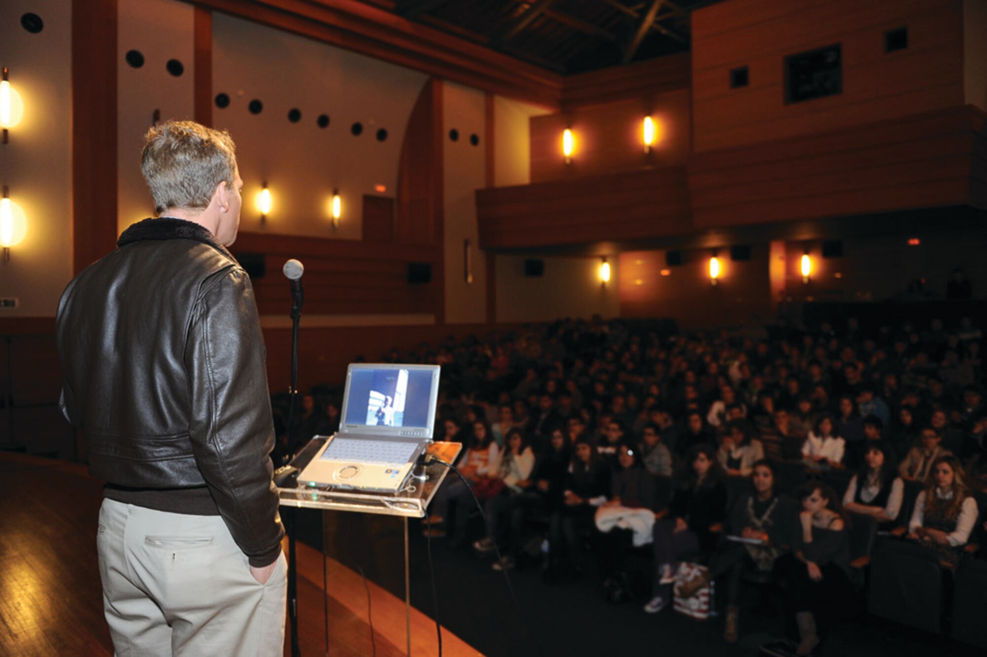 Dr. Scott E. Parazynski briefs students in the local community at Auditorio do Ramo Grande, Praia da Vitoria, March 17, 2011.  Dr. Parazynski also visited and talked with students at the Lajes DODDS Elementary/High School.  (Photo by Guido Melo)