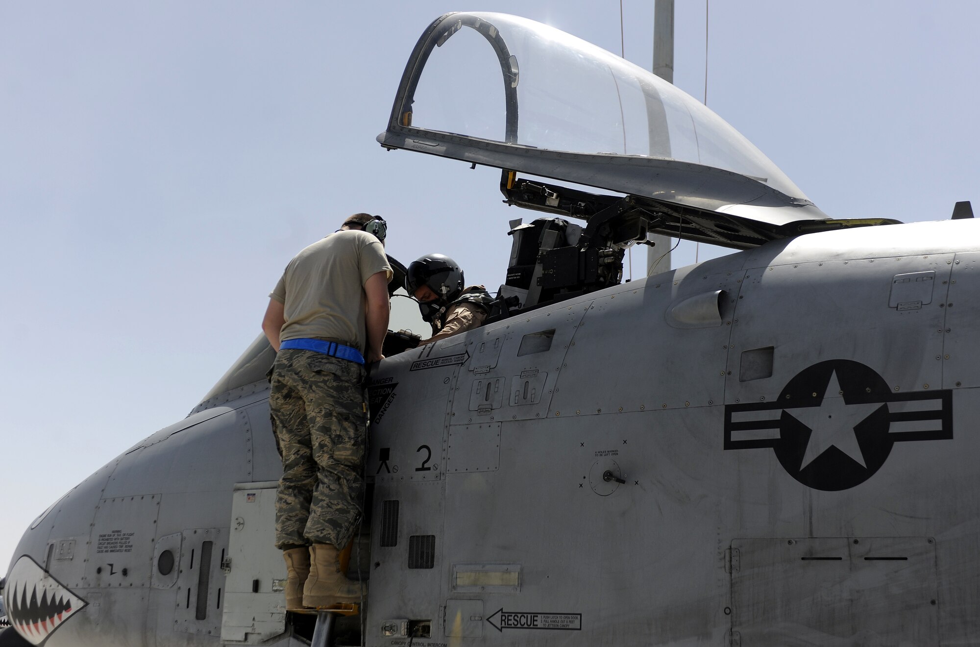 Airman 1st Class Ronald Steinhelfer runs through a pre-flight check list with the pilot of an A-10C Thunderbolt March 24, 2011, at Kandahar Air Field, Afghanistan. Airman Steinhelfer is an A-10 avionics specialist stationed at Moody Air Force Base, Ga., but currently assigned to the 74th Expeditionary Fighter Squadron. (U.S. Air Force photo/Senior Airman Willard E. Grande II)