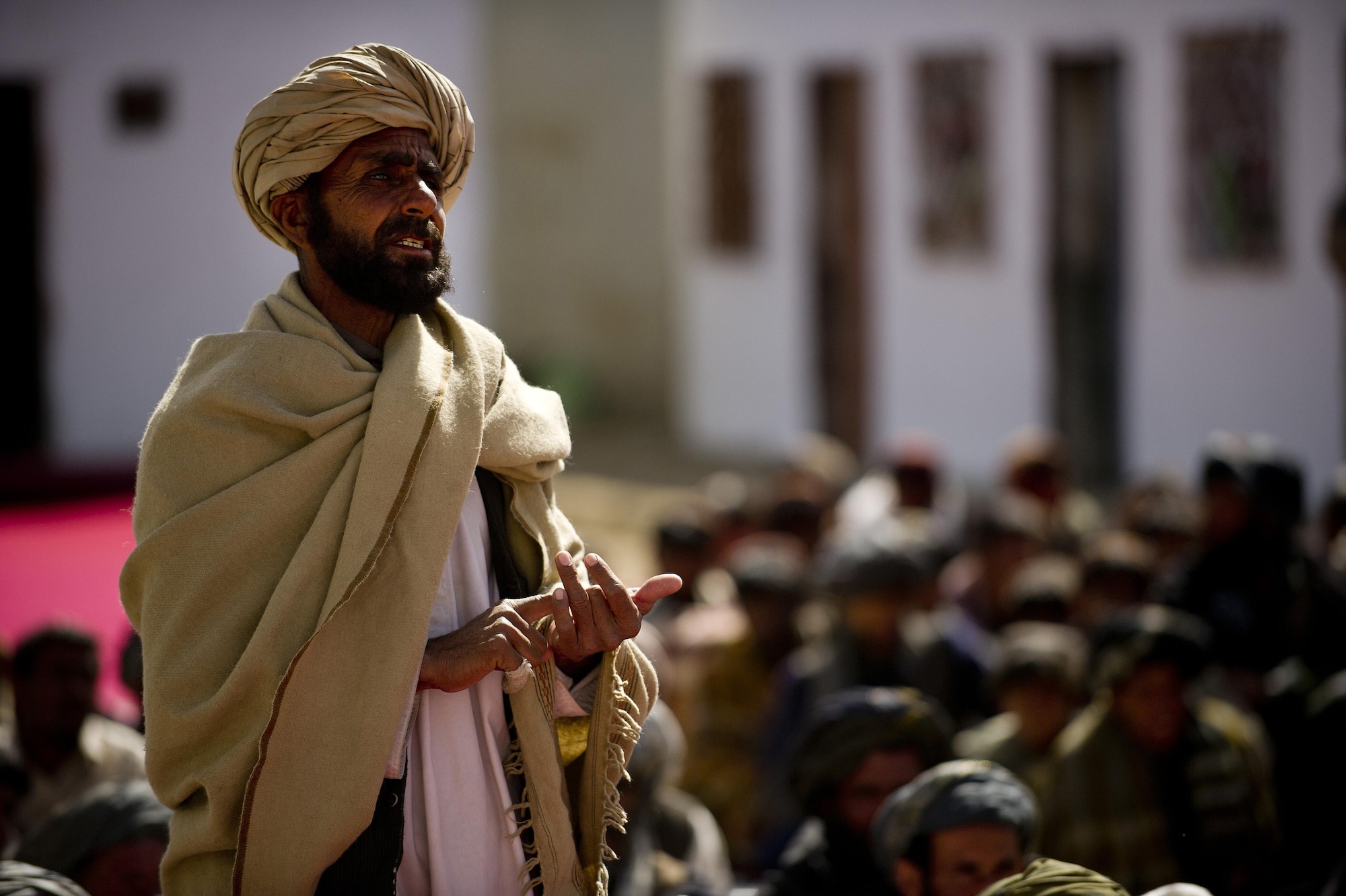 A Shamulzai District resident voices his concerns at the local police headquarters in the Shamulzai District of the Zabul province in Afghanistan during a diplomacy shura. Shamulzai District residents were attending a diplomacy shura to voice their needs and concerns to the Zabul province governor who was in attendance. (U.S. Air Force photo/Master Sgt. Adrian Cadiz)