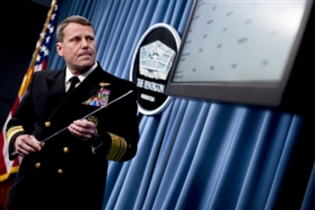 Navy Vice Adm. William E. Gortney, director of the Joint Staff, updates the media at a briefing on Operation Odyssey Dawn at the Pentagon, March 25, 2011.