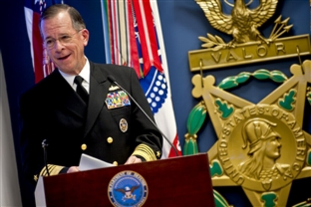 Navy Adm. Mike Mullen, chairman of the Joint Chiefs of Staff, addresses audience members at a ceremony honoring the 150th anniversary of the Medal of Honor in the Hall of Heroes at the Pentagon, March 25, 2011.