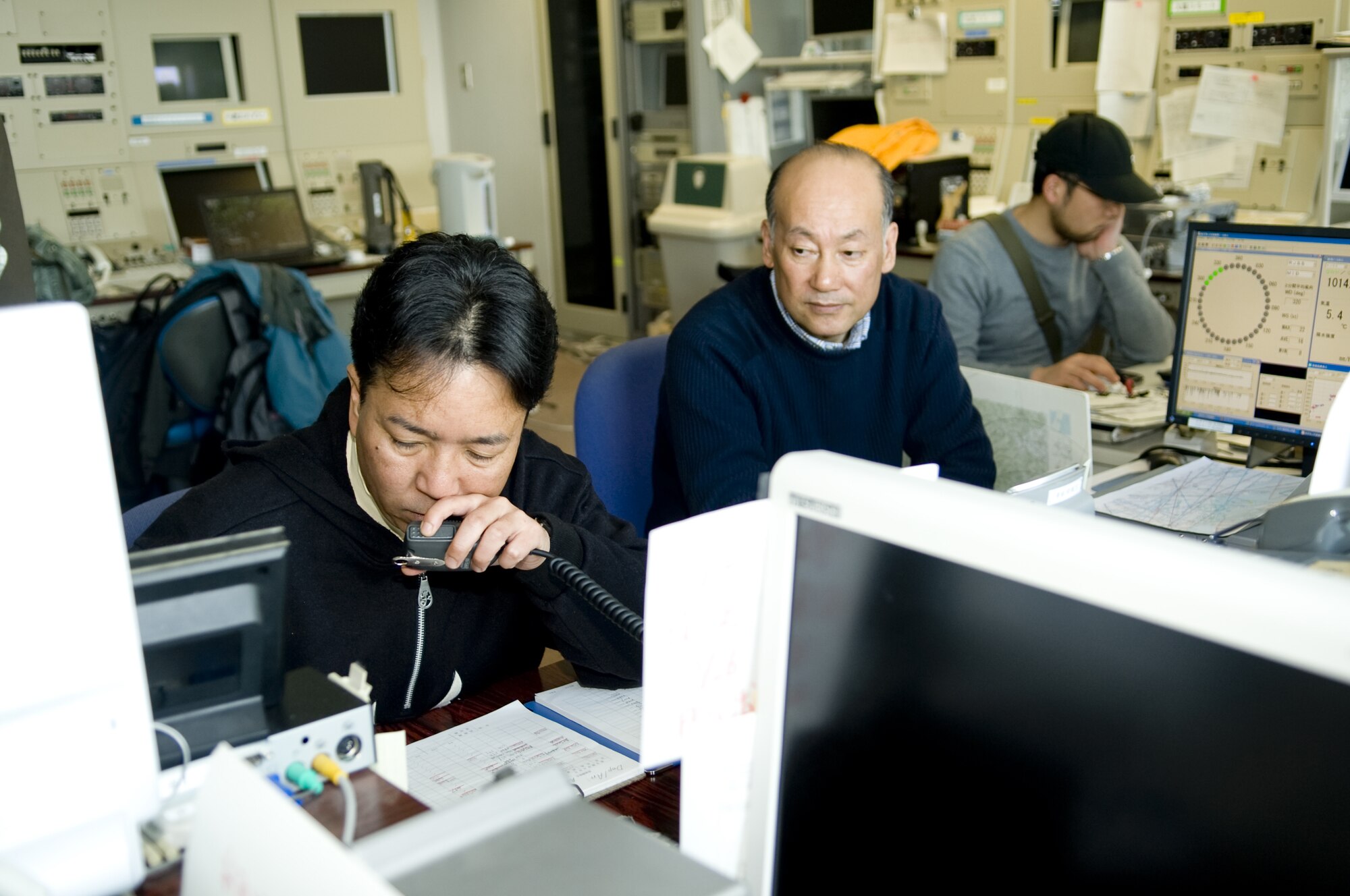 SENDAI AIRPORT, Japan -- Japanese air traffic controllers coordinate with the U.S. Air Force to land aircraft at Sendai Airport, March 26. The two nations working together is a vital element to keep humanitarian supplies flowing to Sendai Airport in support of Operation Tomodachi. (U.S. Air Force photo by/Master Sgt. Jeromy K. Cross)







