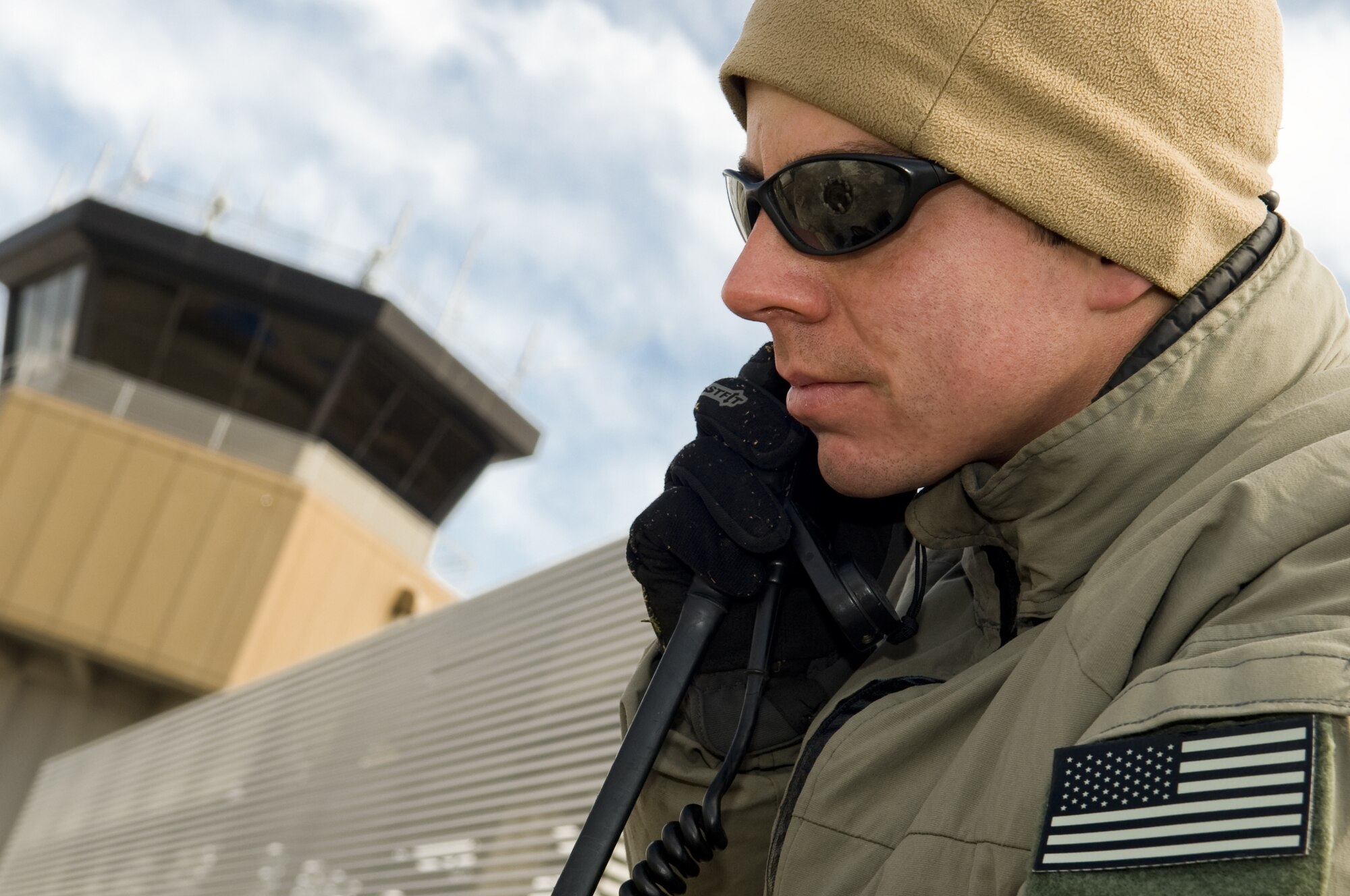 SENDAI AIRPORT, Japan -- U.S. Air Force Staff Sgt. James Graham, 320th Special Tactics Squadron, Kadena Air Base, Japan, works with Japanese air traffic controllers to land aircraft at Sendai Airport, March 26. The two nations working together is a vital element to keep humanitarian supplies flowing to Sendai Airport in support of Operation Tomodachi. (U.S. Air Force photo by/Master Sgt. Jeromy K. Cross)








