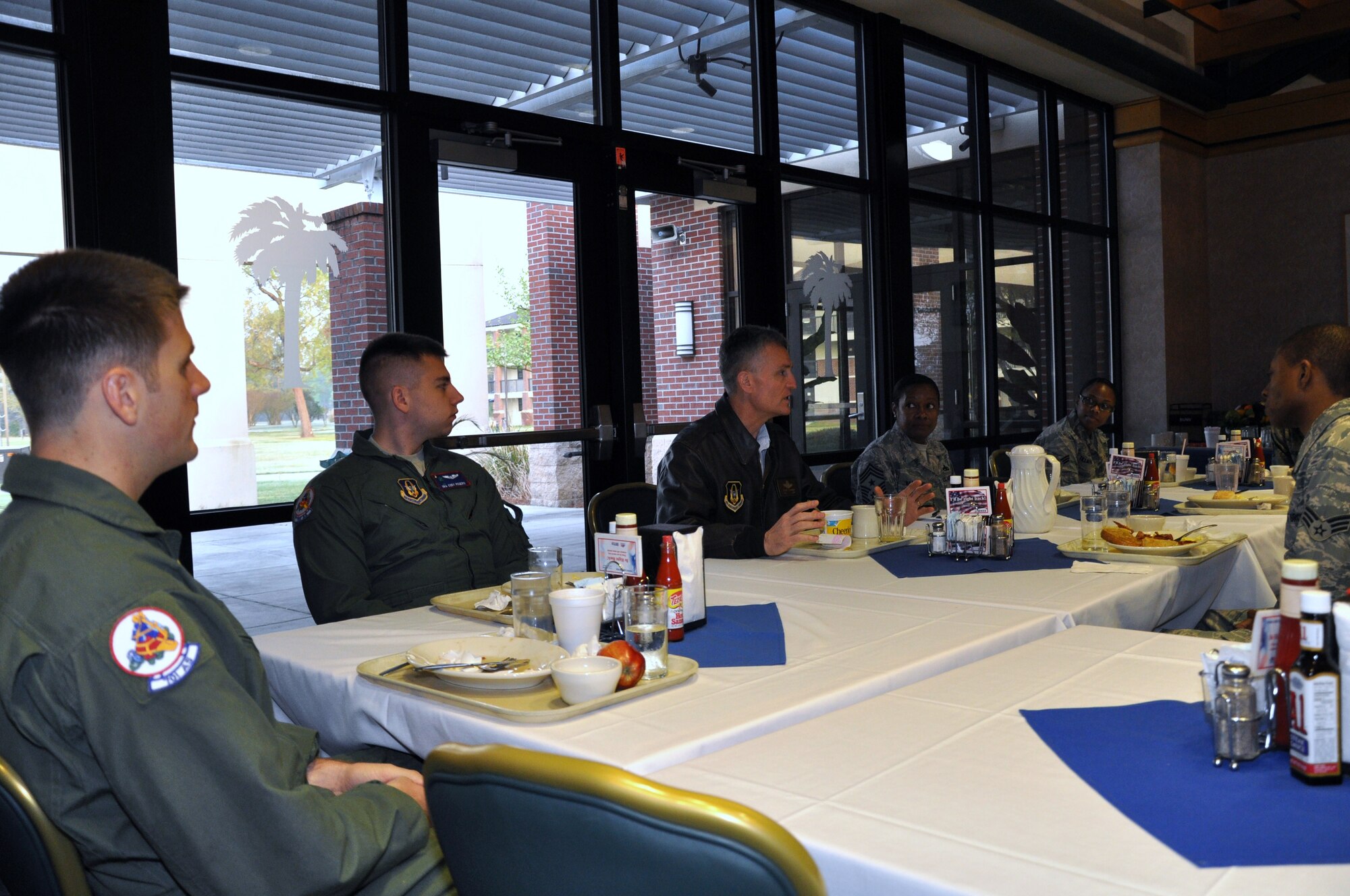 JOINT BASE CHARLESTON, S.C.-- Col. Steven Chapman, 315th Airlift Wing Commander, and Chief Master Sgt. GiGi Manning, 315th AW Command Chief, take time out of their busy UTA to have breakfast with some enlisted members of the 315th AW. Some of the topics discussed were the Fit to Fight program, training and education, service to your local community and family involvement. (U.S. Air Force photo/ Tech. Sgt. Scott Mathews) 