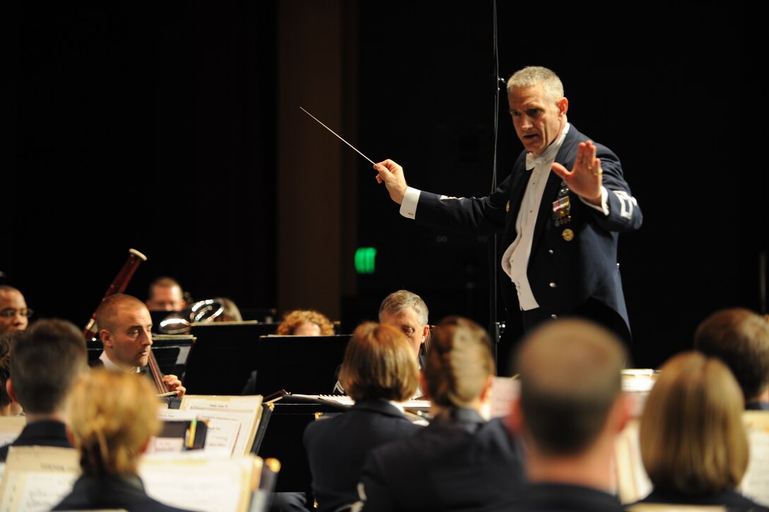 Lt. Col. A. Phillip Waite, Commander and Conductor of The USAF Band, leads the Concert Band during the 2010 fall tour.  This April, the Concert Band and Singing Sergeants will embark on a 19-day tour through the states of Oklahoma, Texas and Louisiana. All of the concerts will be free and open to the public, but do require tickets. The latest information concerning ticket distribution for each performance will be posted on our website calendar.  (Photo by Senior Airman Christopher Ruano)