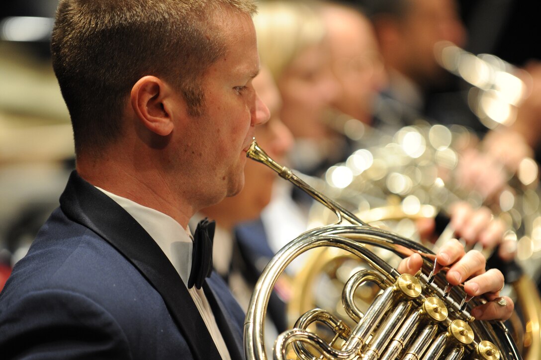 Tech. Sgt. Joel Wealer performs on French horn with the Concert Band during the 2010 fall tour.  This April, the Concert Band and Singing Sergeants will embark on a 19-day tour through the states of Oklahoma, Texas and Louisiana. All of the concerts will be free and open to the public, but do require tickets. The latest information concerning ticket distribution for each performance will be posted on our website calendar.  (Photo by Senior Airman Christopher Ruano)