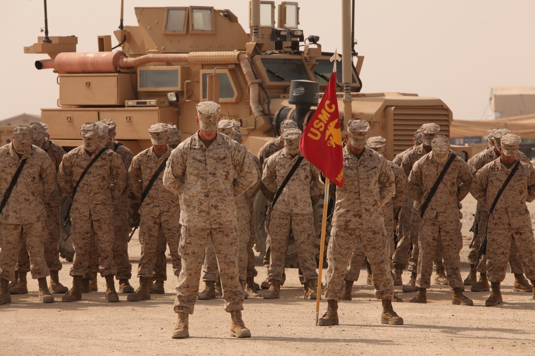 Marines and Sailors bow their heads during the chaplain’s invocation at Marine Wing Support Squadron 373’s transfer of authority to MWSS-272 at Camp Leatherneck, Afghanistan, March 27. The transfer of authority ceremony not only symbolized the end of MWSS-373’s operational responsibilities in support of Regional Command Southwest, but served as a beginning to MWSS-272’s commitment in support of2nd Marine Aircraft Wing (Forward) and its coalition partners in Afghanistan.