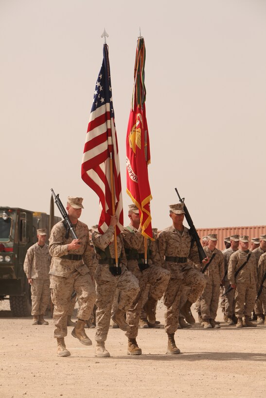 The Marine Wing Support Squadron 373 color guard marches on the colors during MWSS-373’s transfer of authority to MWSS-272 at Camp Leatherneck, Afghanistan, March 27. “MWSS-272 has shown that they are going to pick up the torch and run with it a little further up the hill,” said Sgt. Maj. Michael Mack, the sergeant major for MWSS-373.