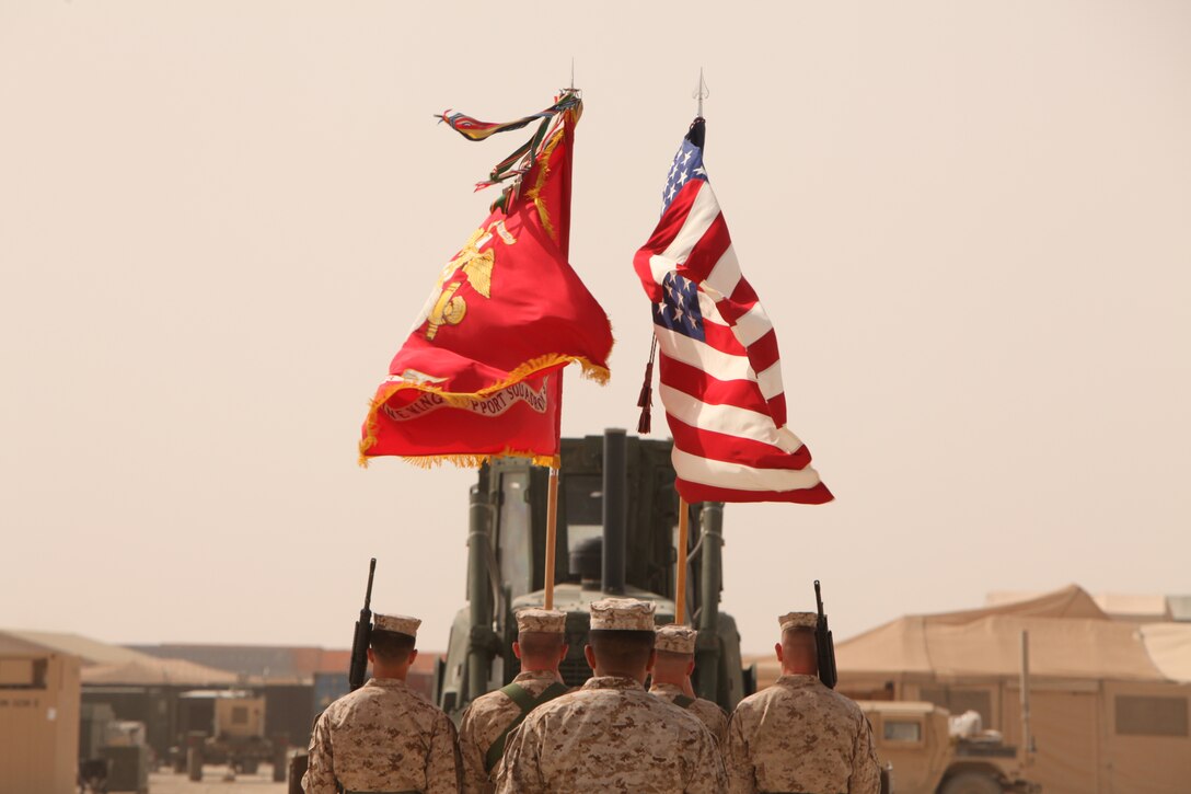 The Marine Wing Support Squadron 373 color guard marches with the American flag and the squadron’s battle colors during MWSS-373’s transfer of authority to MWSS-272 at Camp Leatherneck, Afghanistan, March 27. The transfer of authority ceremony not only symbolized the end of MWSS-373’s operational responsibilities in support of Regional Command Southwest, but served as a beginning to MWSS-272’s commitment in support of2nd Marine Aircraft Wing (Forward) and its coalition partners in Afghanistan.