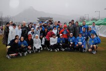 SEOUL, Republic of Korea - Members of Team Osan pose for a photo prior to running the Seoul International Marathon March 20. The team members were running for Knights of Heroes, an organization which sponsors a week-long camp for families who have lost a servicemember. (courtesy photo)