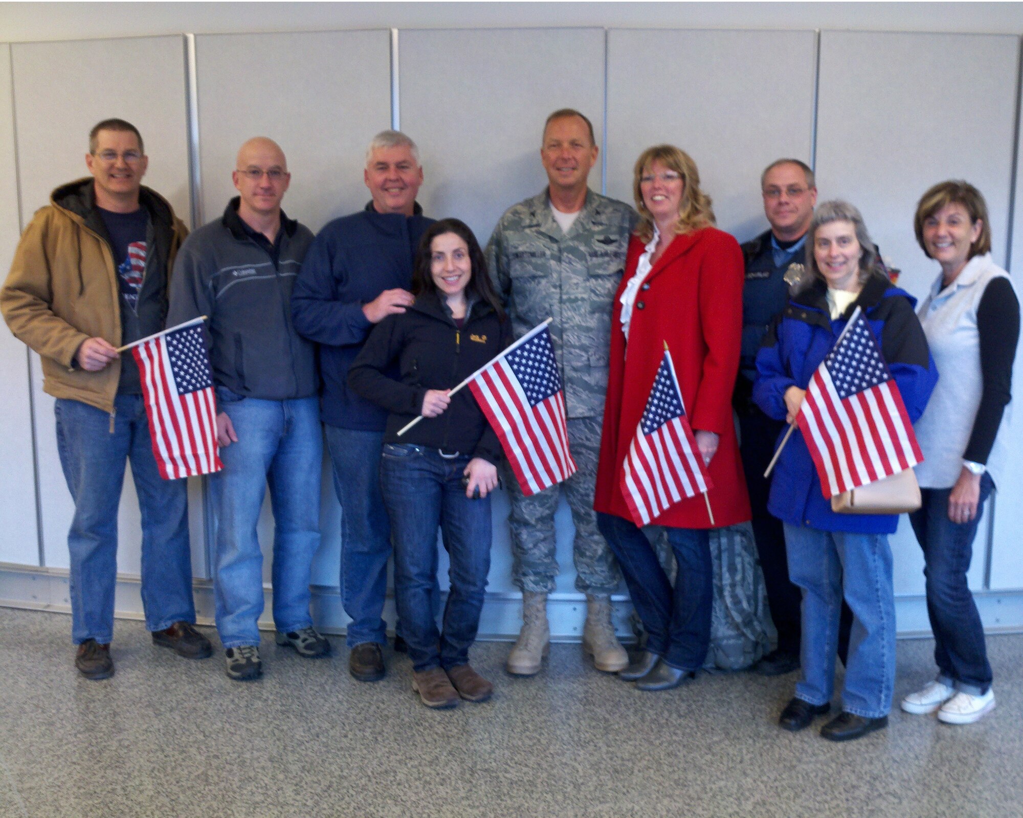 914th Airlift Wing Commander Col. Allan L. Swartzmiller is met by friends and family at the Buffalo Airport, March 26, 2011, Buffalo, NY. Col. Swartzmiller is returning from a deployment to an undisclosed location in south west Asia. (Courtesy photo by Cal Pitruzzella) 