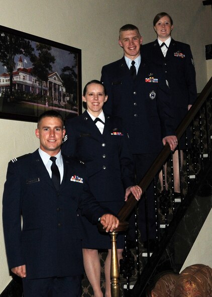 The Spirit of St. Louis Chapter 186 of the Air Force Association awarded Staff Sgt. Danielle Sronce,131st Bomb Wing (upper right), with an “Outstanding Airman of the Year” Award during their 36th annual awards banquet honoring local area Airmen at Glen Echo Country Club in Saint Louis, March 25. Also receiving awards were: Cadet (Col) Daniel Emirbayer, AF ROTC Det.207, Senior Airman Angela Mueller, 157th Air Operations Group, and Staff Sgt. Jeffrey Dobrow, 345th Air Force Recruiting Squadron.  (Photo by Master Sgt. Mary-Dale Amison)   