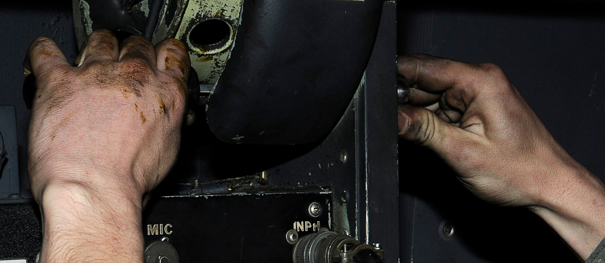 YOKOTA AIR BASE, Japan -- Airman 1st Class Dustin Lingel, 374th Aircraft Maintenance Squadron, takes out a bolt in the negator spring on a C-130 at Yokota March 23. The Airmen assigned to the 374th Airlift Wing are committed to providing support during ongoing disaster relief operations. (U.S. Air Force photo/Master Sgt. Jeromy K. Cross)








