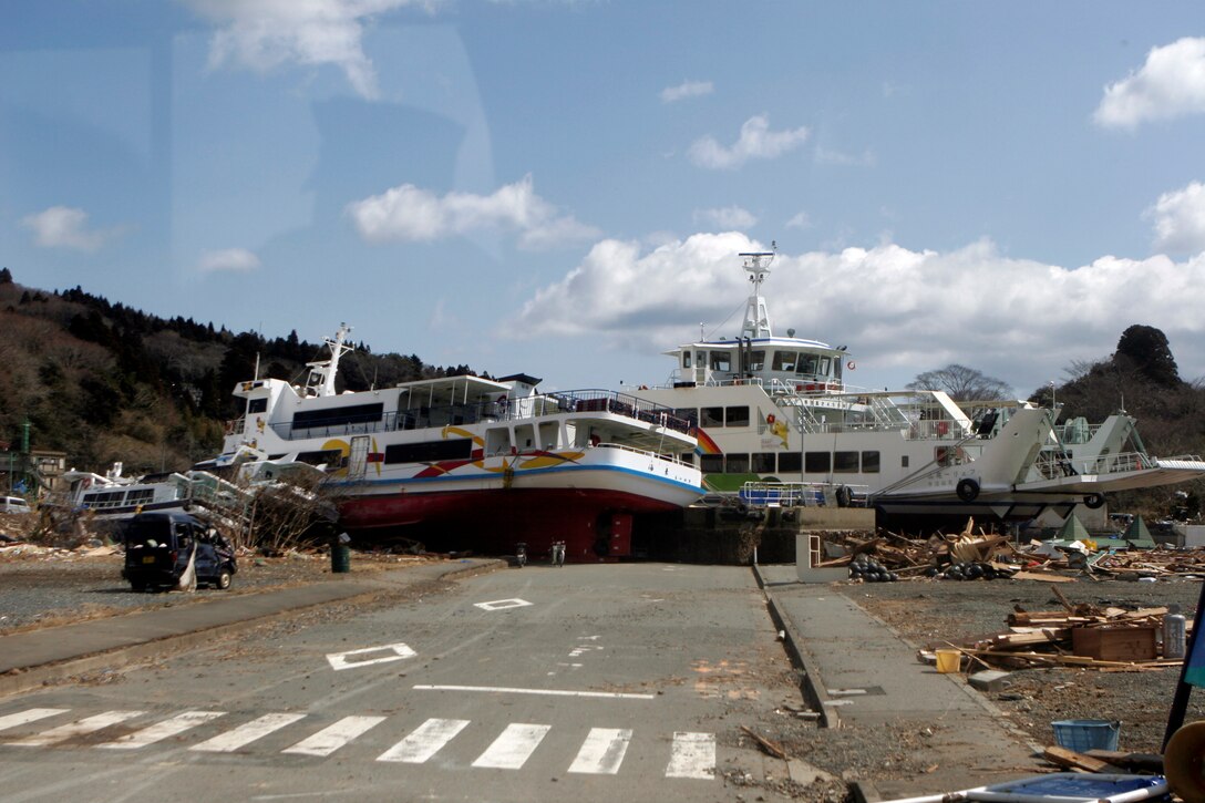 Ferries rest nearly 500 meters inland on Oshima Island, March 27. The 31st Marine Expeditionary Unit delivered food, water, health and comfort supplies, and Japanese electrical utility vehicles to the isolated island, in conjunction with Japanese Self-Defense Forces. The 31st MEU’s involvement is part of a larger U.S. government response, after a 9.0 earthquake and subsequent tsunami struck Japan causing widespread damage. The 31st MEU is ready to support our Japanese partners and to provide assistance when called upon.