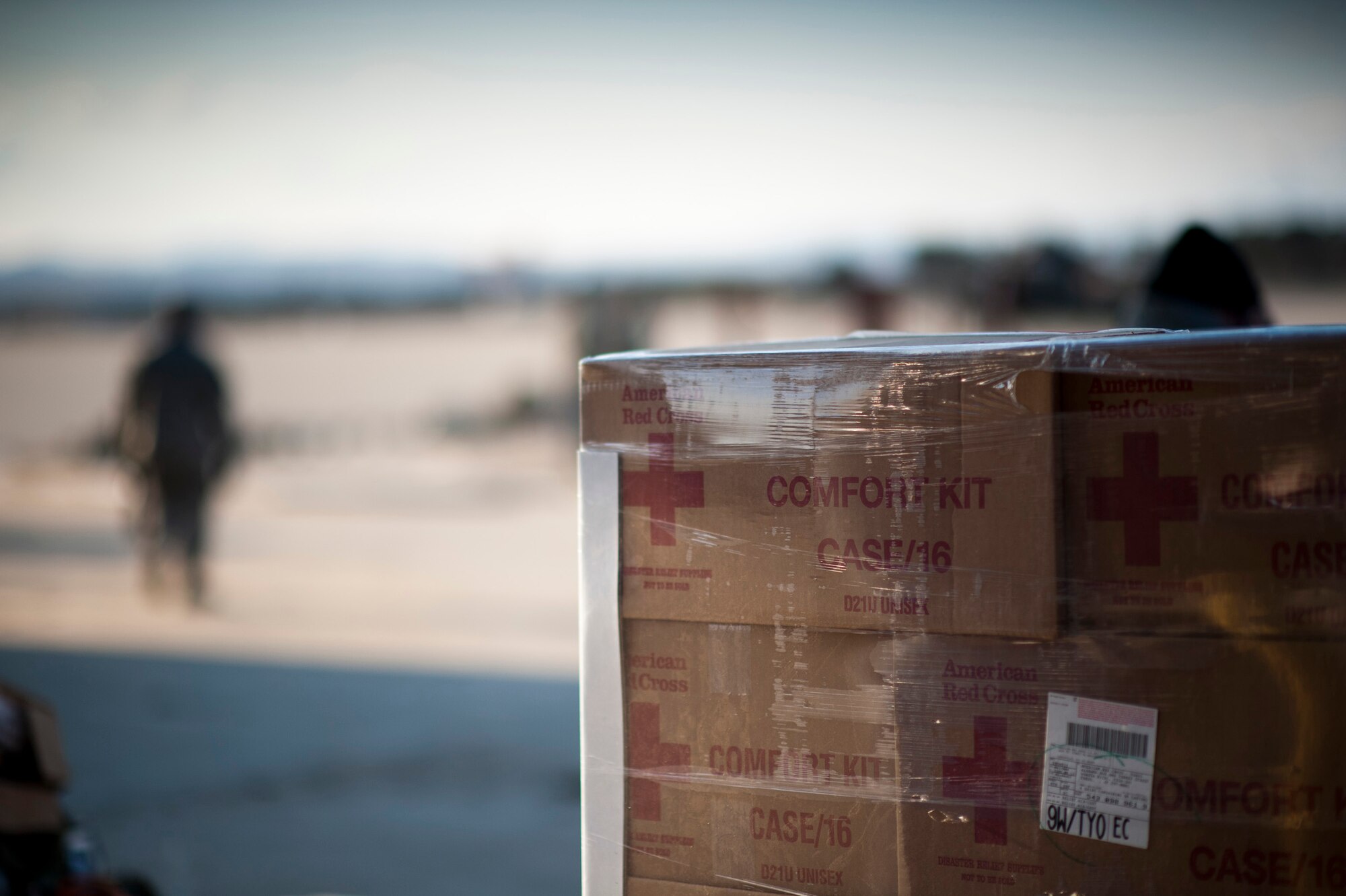 SENDAI AIRPORT, Japan -- A crate of humanitarian aid from the American Red Cross sits on the flightline at Sendai Airport, Japan, March 28, 2011. American humanitarian aid organizations such as the American Red Cross have donated supplies to help those displaced by the earthquake and tsunami of March 11. (U.S. Air Force photo/Staff Sgt. Samuel Morse)