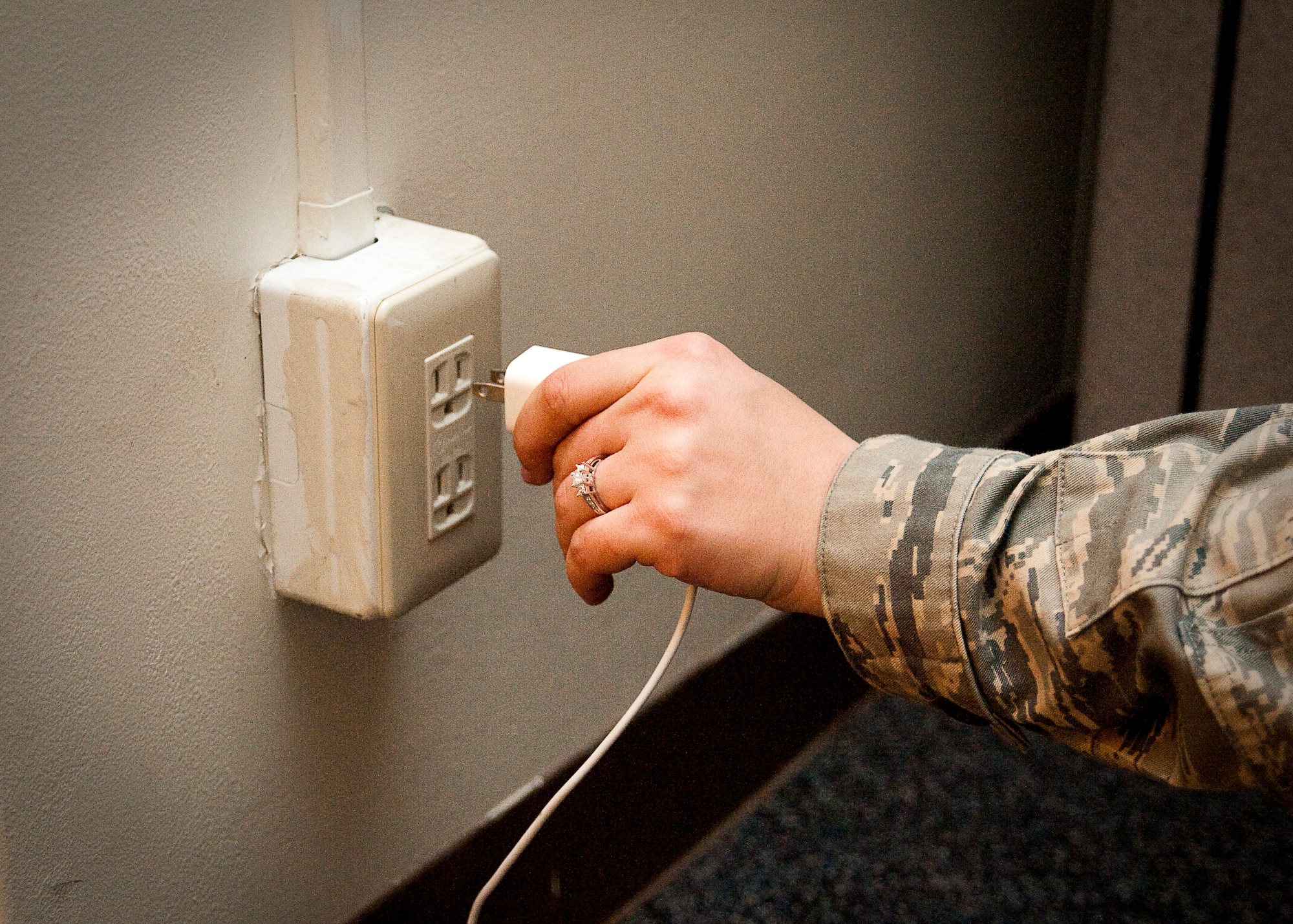 YOKOTA AIR BASE, Japan -- Unplugging electronics when not in use is one way to conserve energy. To help reduce demand on Japan's power grid, Yokota personnel are encouraged to save energy by turning off lights, unplugging appliances and conservatively using facility heating, ventilation and air conditioning systems. (U.S. Air Force photo/Airman 1st Class Andrea Salazar)