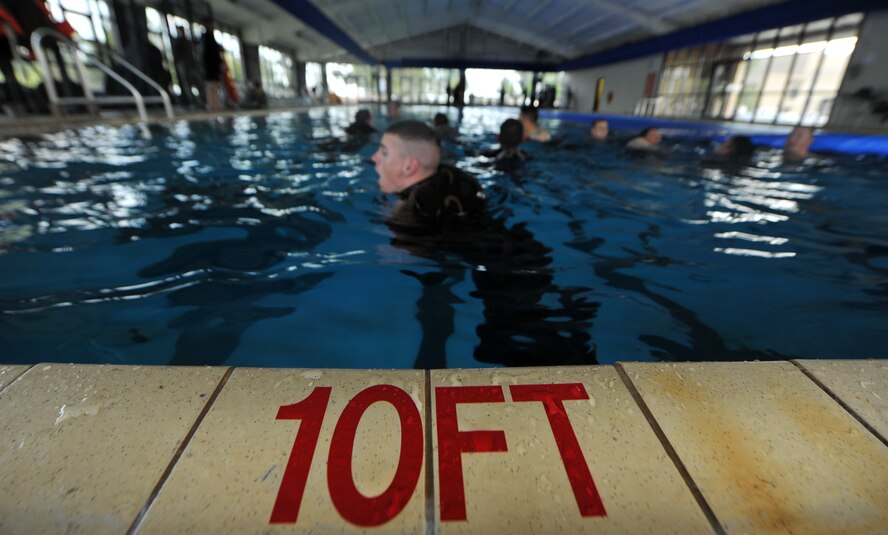 MOODY AIR FORCE BASE, Ga.-- Trainees participating in the air liaison officer training course swim in an indoor pool during water confidence training March 23. During the training trainees were given multiple tasks to accomplish while keeping calm under pressure. (U.S. Air Force photo/Airman 1st Class Joshua Green)(RELEASED)
