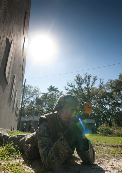 MOODY AIR FORCE BASE, Ga.-- U.S. Air Force Academy cadet Andrew Jaris lays low during a combat portion of the air liaison officer training March 24. The trainees were tasked with a mission that involved clearing buildings and finding a wingman left behind. (U.S. Air Force photo/Airman 1st Class Joshua Green)(RELEASED)
