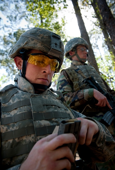 MOODY AIR FORCE BASE, Ga.-- 2nd Lt. Nicholas Brewer, 28th Test and Evaluation, Eglin Air Force Base, Fla., loads a clip full of bullets during a combat training March 24. Lieutenant Brewer participated in the air liaison officer training as a preliminary course to the school he’ll attend if recommended. (U.S. Air Force photo/Airman 1st Class Joshua Green)(RELEASED)
