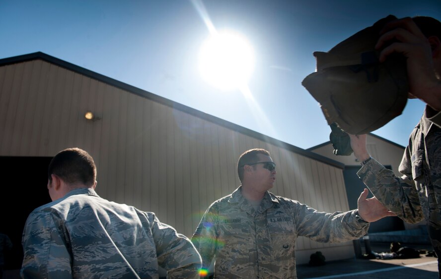 MOODY AIR FORCE BASE, Ga.-- Tech. Sgt. Robert Callaway, 93rd Air Ground Operations Wing tactical air control party member, counts equipment being returned by trainees March 25. The trainees participated in a week long air liaison officer training course to see if they qualified for the real course. (U.S. Air Force photo/Airman 1st Class Joshua Green)(RELEASED)
