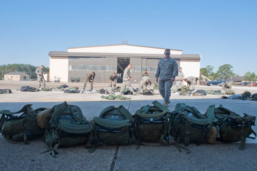 MOODY AIR FORCE BASE, Ga. -- A line of “ruck” sacks sit waiting to be unpacked during the air liaison officer aptitude assessment March 25. The last day was made up of issued gear turn in and boards where the members sat and were interviewed to determine if they should be picked to continue. (U.S. Air Force photo/Airman 1st Class Nicholas Benroth)(RELEASED)