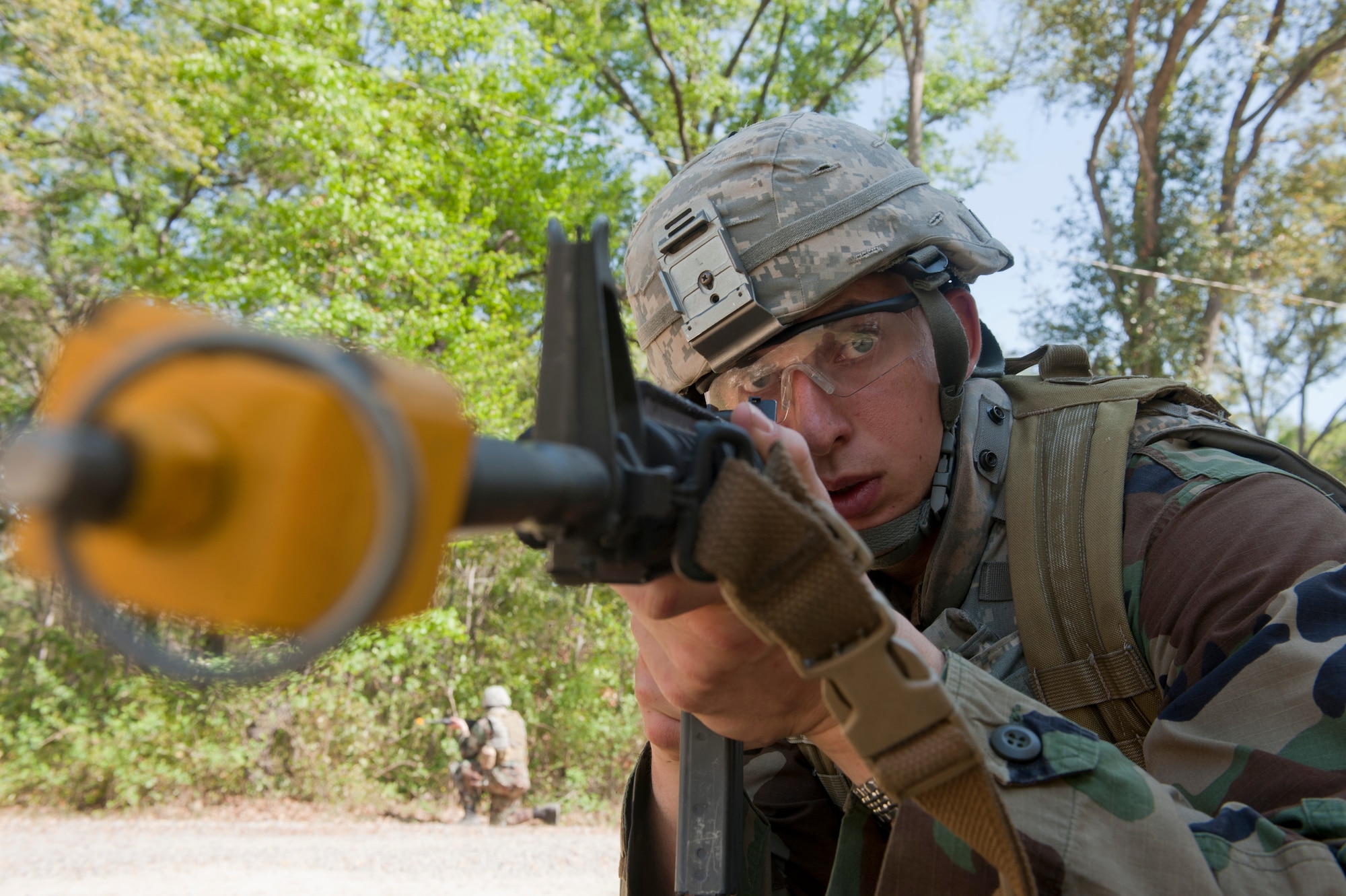 MOODY AIR FORCE BASE, Ga. -- U.S. Air Force Academy cadet Tytus Moss provides security for his team as they move through the military operations in urban terrain training village here March 24. This was part of an exercise that judged teamwork, leadership and the ability to perform well under pressure. (U.S. Air Force photo/Airman 1st Class Nicholas Benroth)(RELEASED)