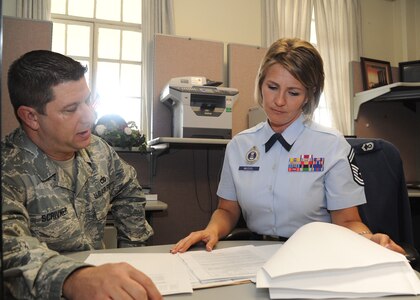 Senior Master Sgt. Kathleen McCool (right), Air Force Recruiting Service Recruiter Screening Team superintendent, counsels a prospective recruiter. She was awarded AETC senior noncommissioned officer of the year for 2010. (U.S. Air Force photo/ courtesy photo)
