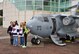 315th Airlift Wing mini C-17 demo team members Master Sgt. Michele Summers, Tech. Sgt. Nelson Irizarry and Tech. Sgt. Glenn Walker, all of the 315th Aircraft Maintenance Squadron, display the mini C-17 at the last home game of the regular season for the South Carolina Stingrays ECHL hockey team March 27. (U.S. Air Force photo by Capt. Wayne Capps)