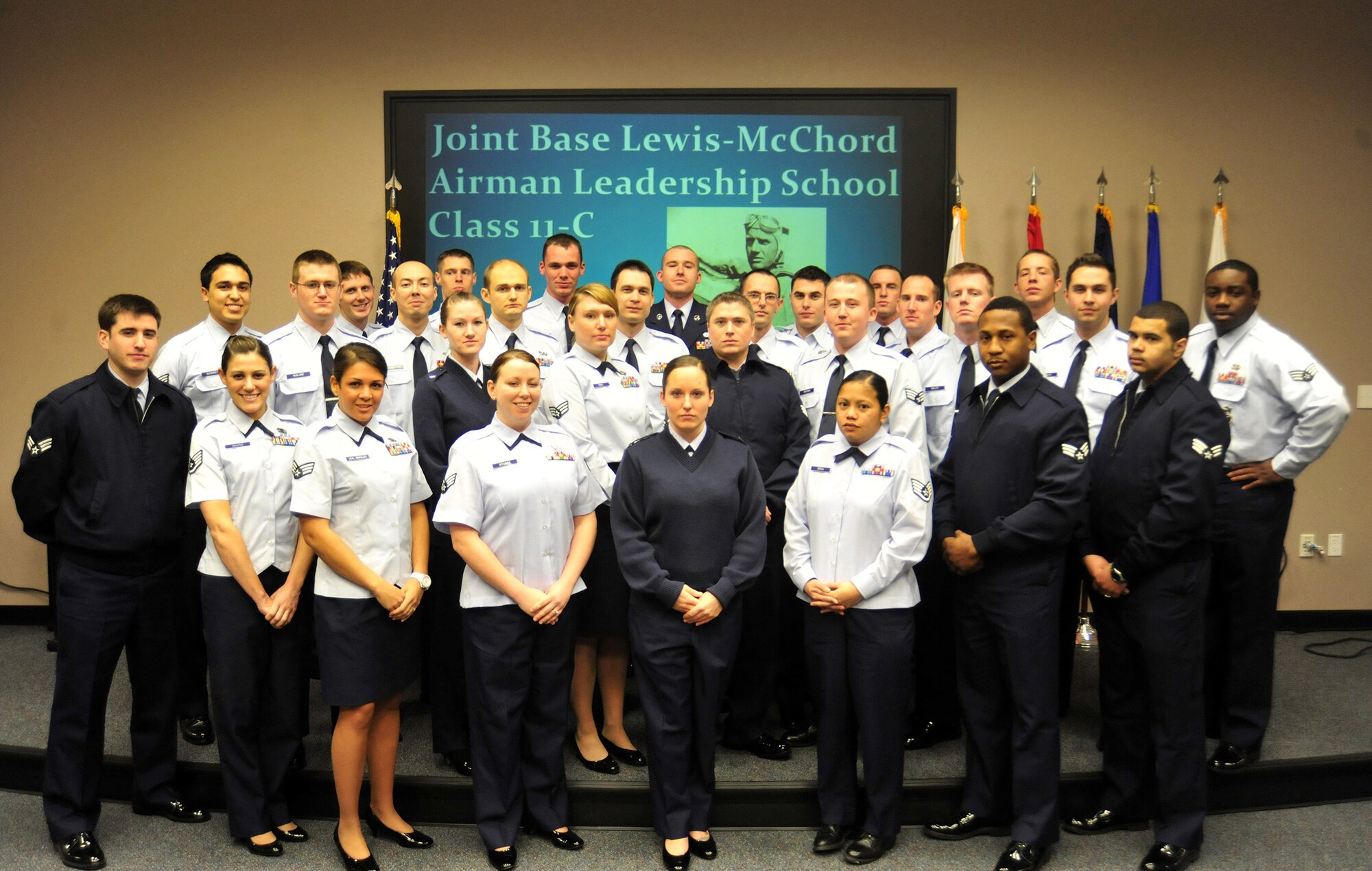 Airmen from Class 11-C at Airman Leadership School pose for a class photo at McChord Field, Joint Base Lewis-McChord, Wash. The class graduated March 24, allowing them to become Non Commissioned Officers and leaders in their various career fields. (U.S. Air Force photo/Airman 1st Class Leah Young)